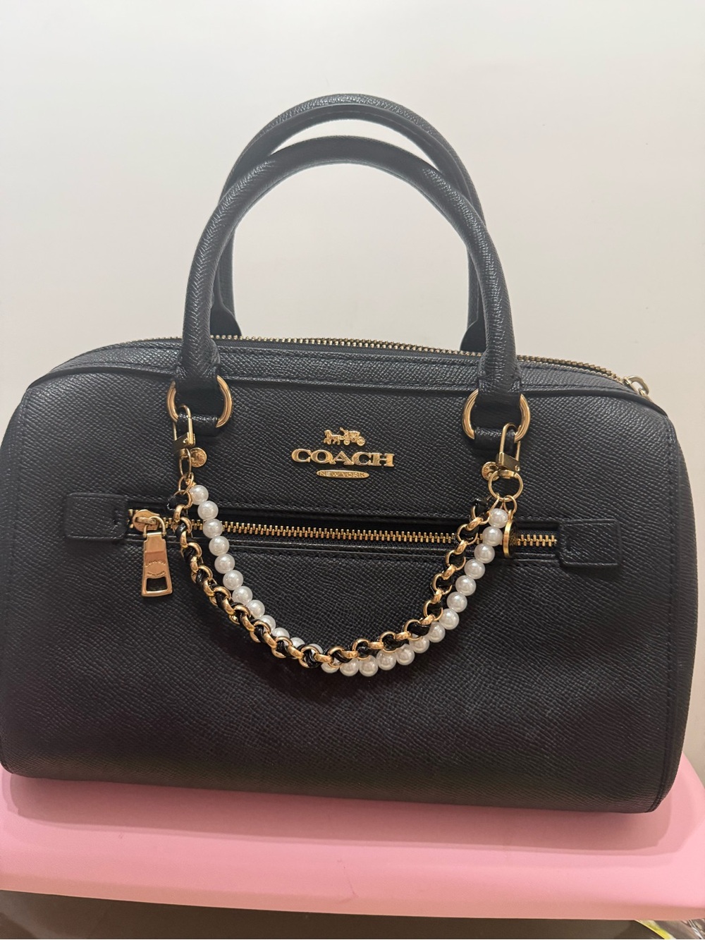 Coach Black Leather Satchel with Gold Hardware and Pearl-Chain Accent